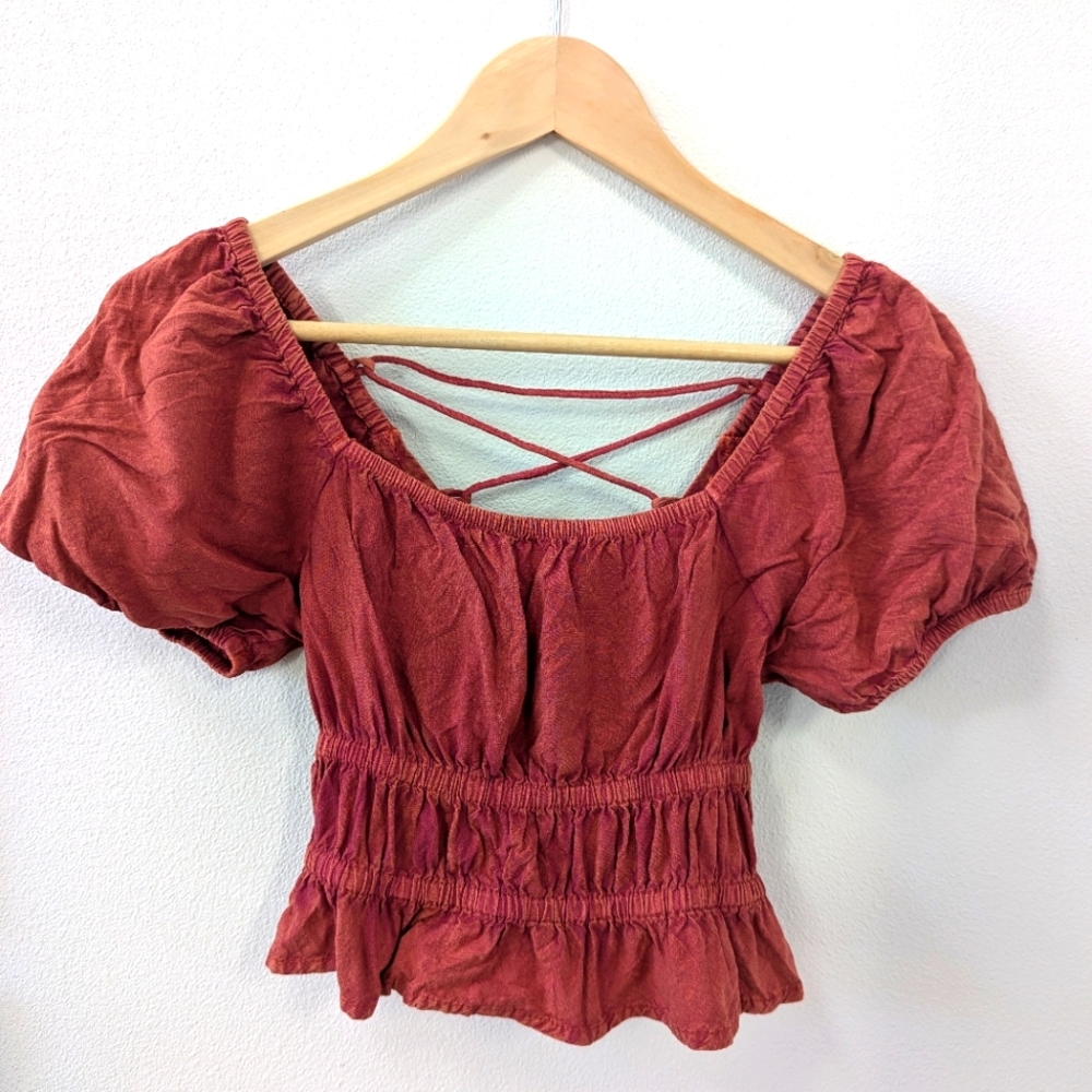 Rebellion again S orange crop top